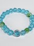 Deep Blue Sea – Green Wave Baby Blue & Green Glass Stretch Bracelet with Silver Frame