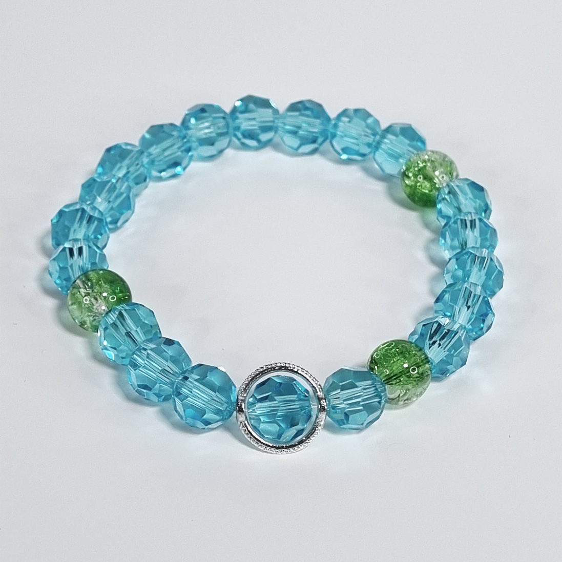 Deep Blue Sea – Green Wave Baby Blue & Green Glass Stretch Bracelet with Silver Frame