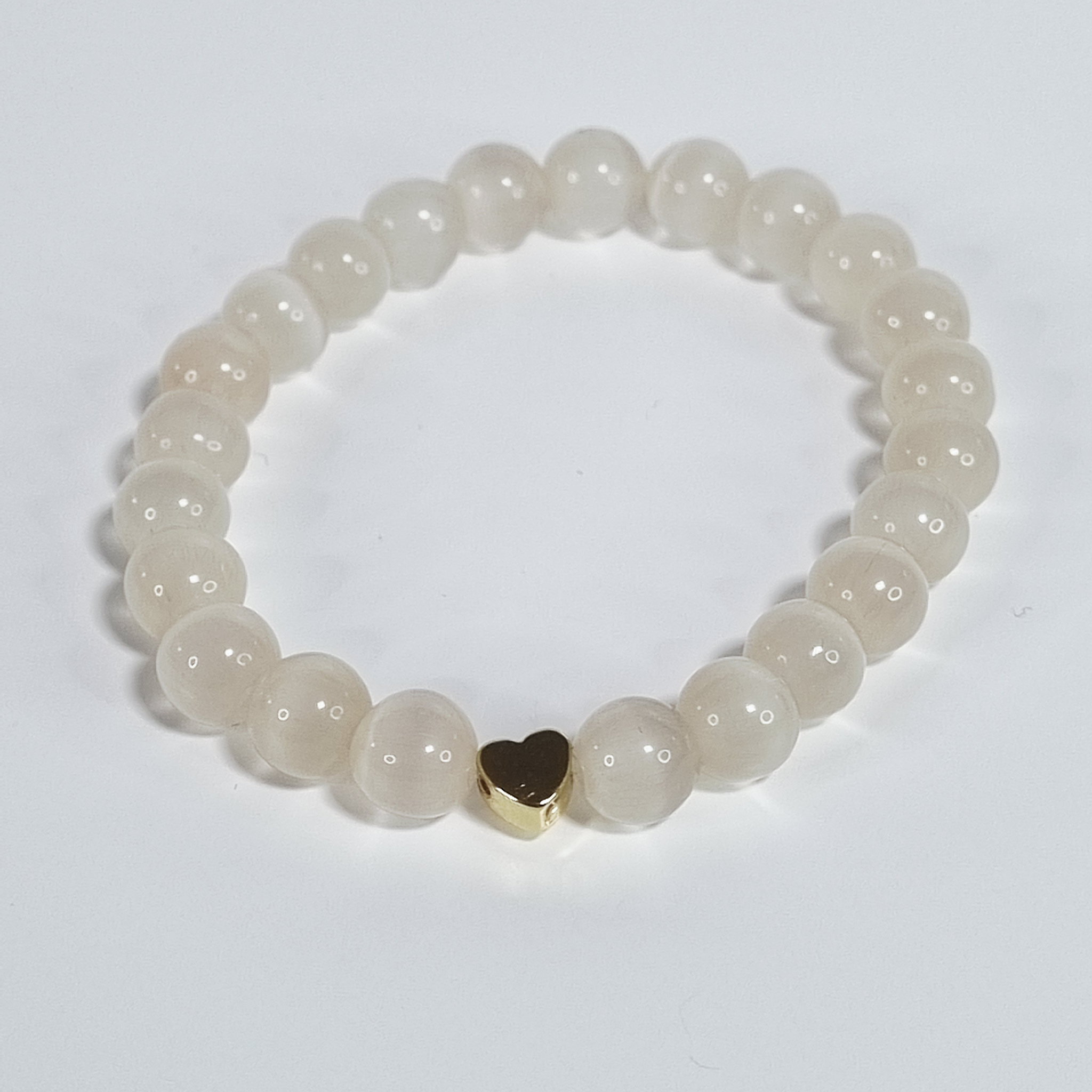 Soft Devotion Handmade Cat Eye Stretch Beige Bracelet with Heart Charm