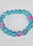 Deep Blue Sea – Blush Tide Baby Blue & Roze Glazen Stretch Armband met Zilveren Frame
