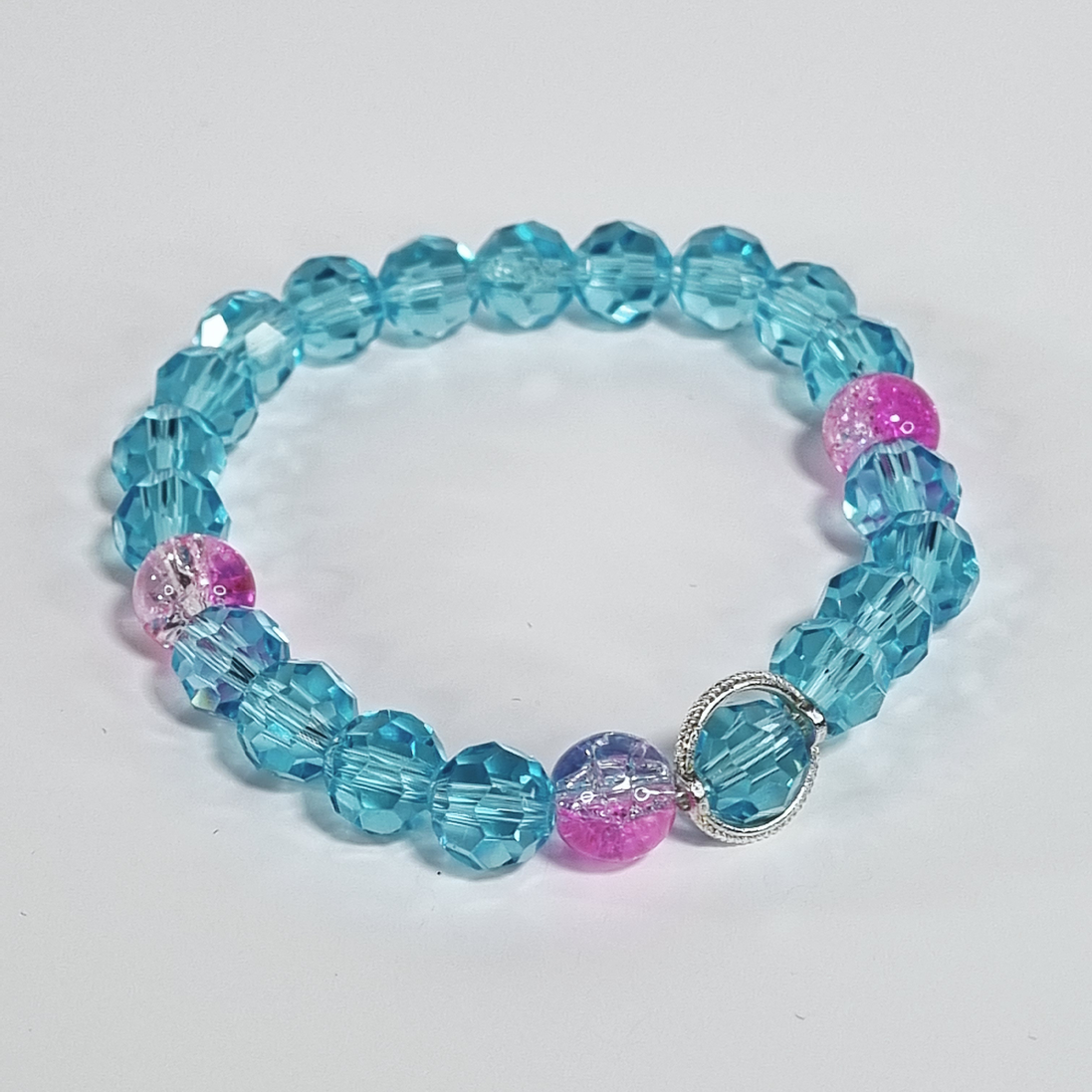 Deep Blue Sea – Blush Tide Baby Blue & Roze Glazen Stretch Armband met Zilveren Frame