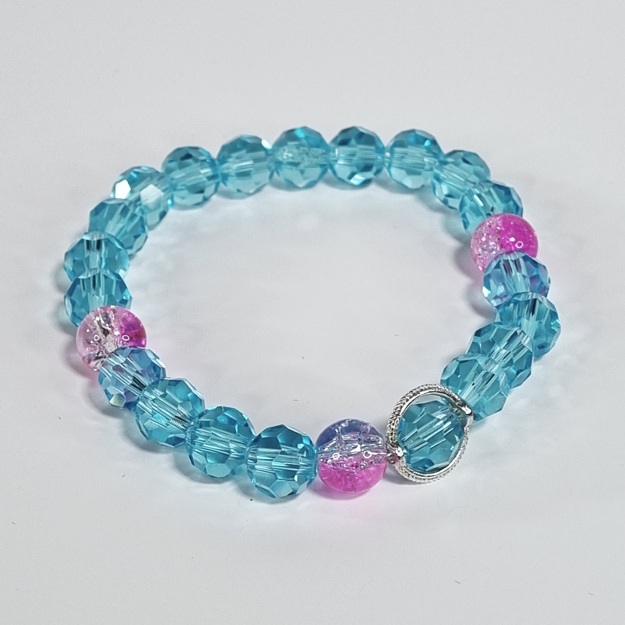 Deep Blue Sea – Blush Tide Baby Blue & Roze Glazen Stretch Armband met Zilveren Frame