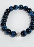 Evergreen Bloom Green-Blue Glass Bead Stretch Bracelet with Silver Flower Spacer