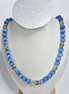 Blue Sky Glass Bead Necklace with Gold Plated Spacers and Color Accents
