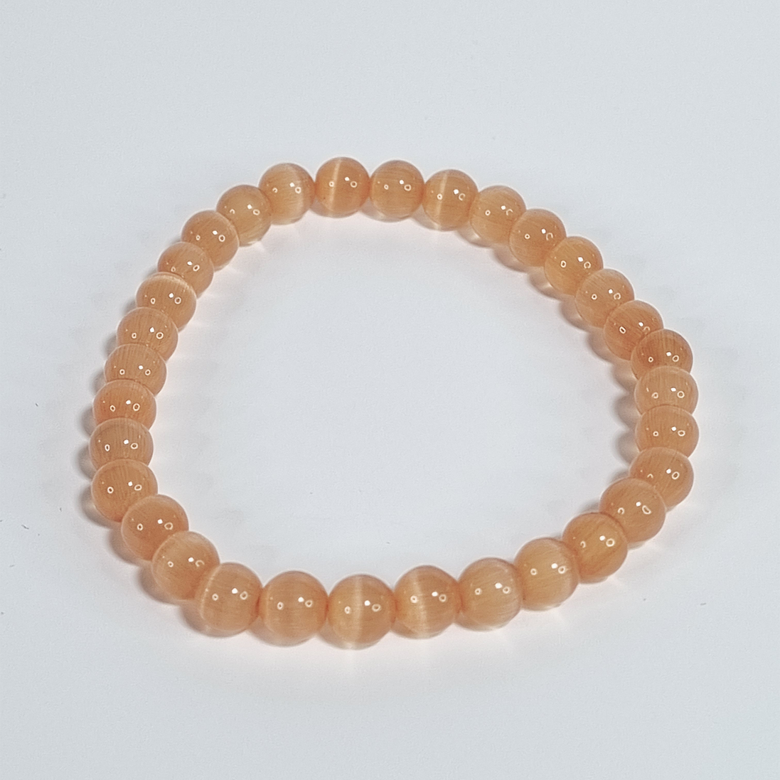 Orange Cat Eye Stretch Bracelet – 6 mm Glass Beads