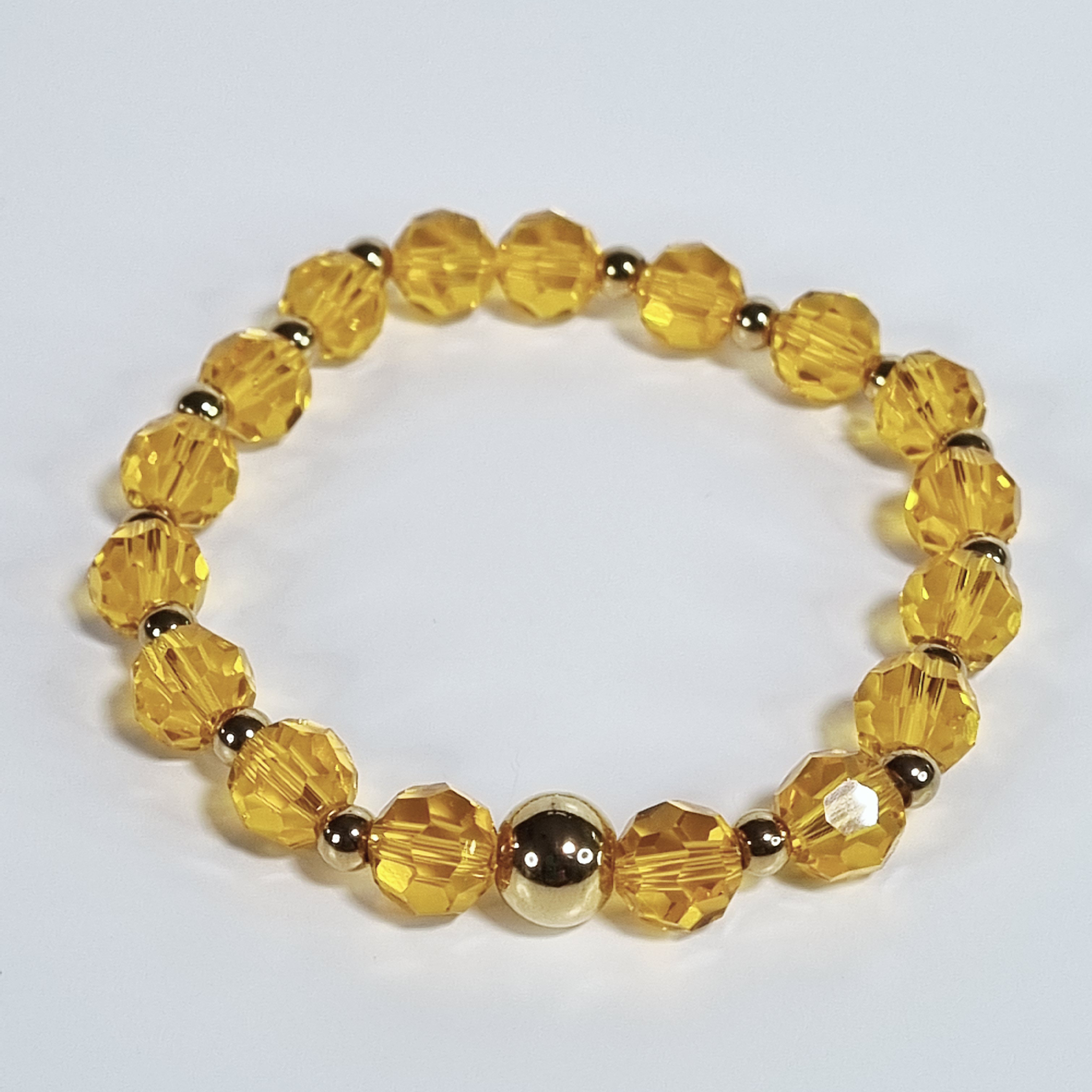 Orange Glass Stretch Bracelet with Gold Plated Spacers