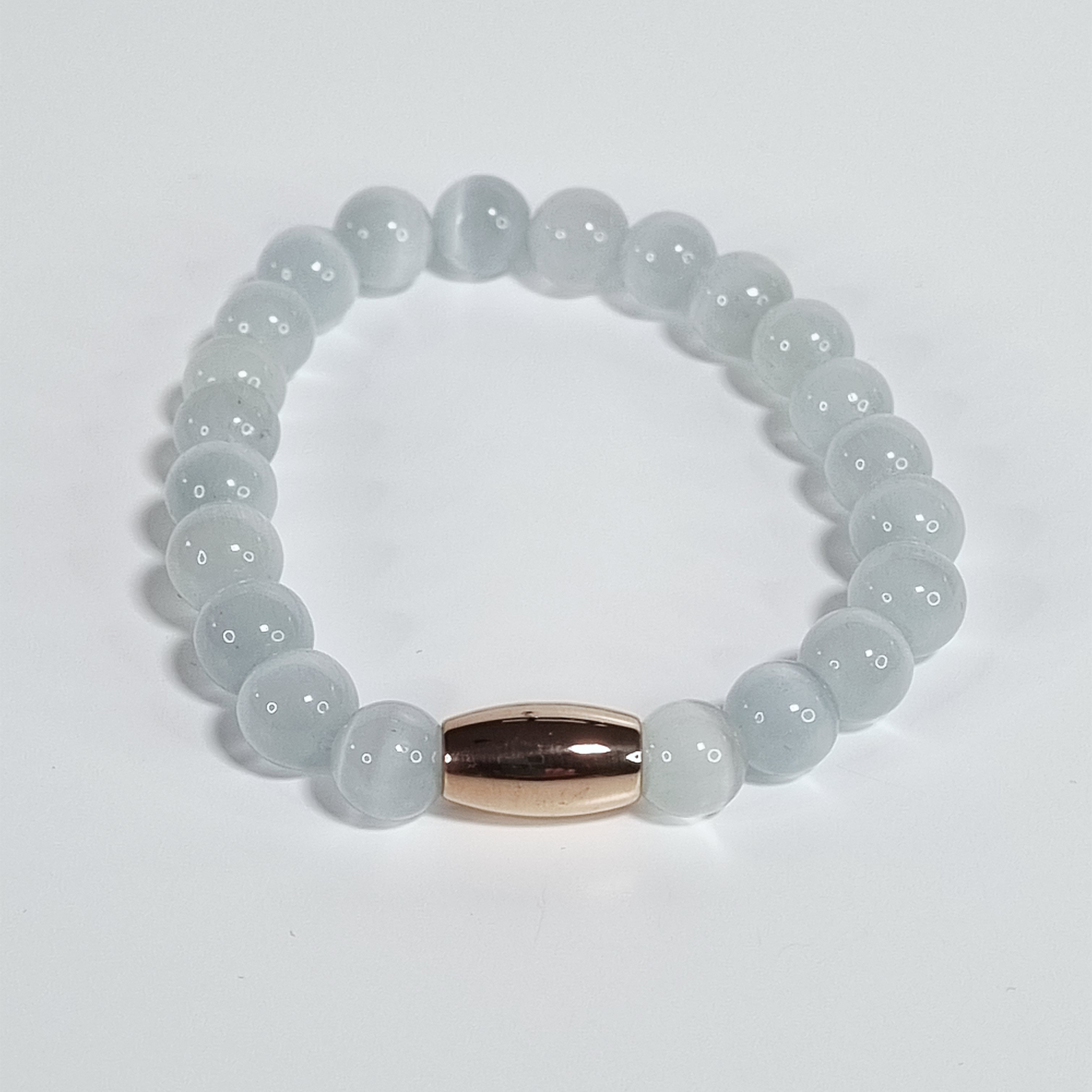 Zachte Roos Witte Glaskraal Stretch Armband met Roségouden Ovale Spacer